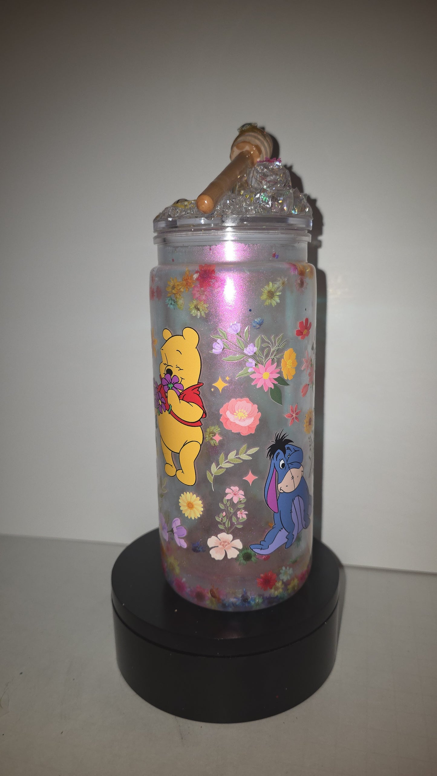 2o oz perlesscent Mica with floating dry flowers. Comes with matching, honey drip ice epoxy lid.