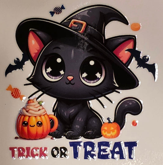 Cute black cat in a witch hat with pumpkins and 'Trick or Treat' text on a marble background