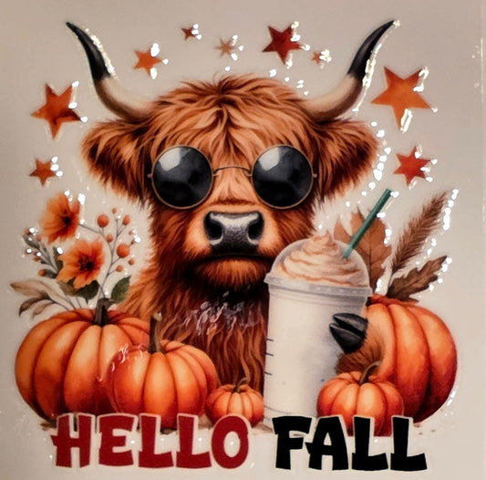 Cute cow with sunglasses surrounded by pumpkins and a drink, with 'Hello Fall' text on a marble background.