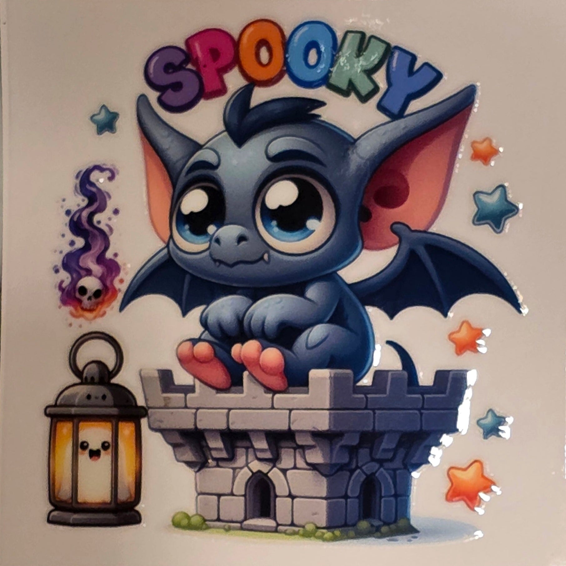 Cartoon dragon with 'Spooky' text on a white background