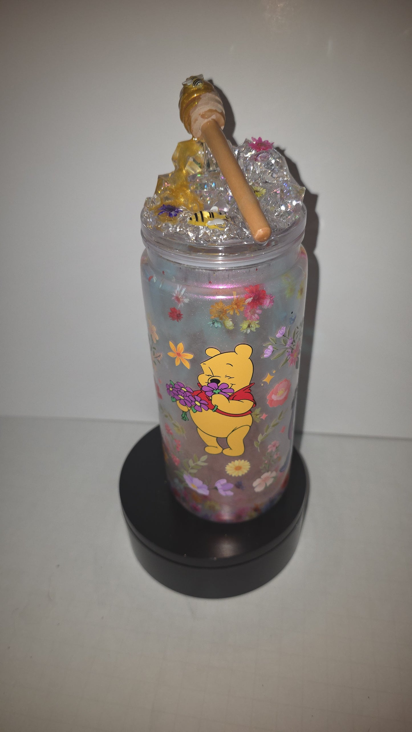 2o oz perlesscent Mica with floating dry flowers. Comes with matching, honey drip ice epoxy lid.