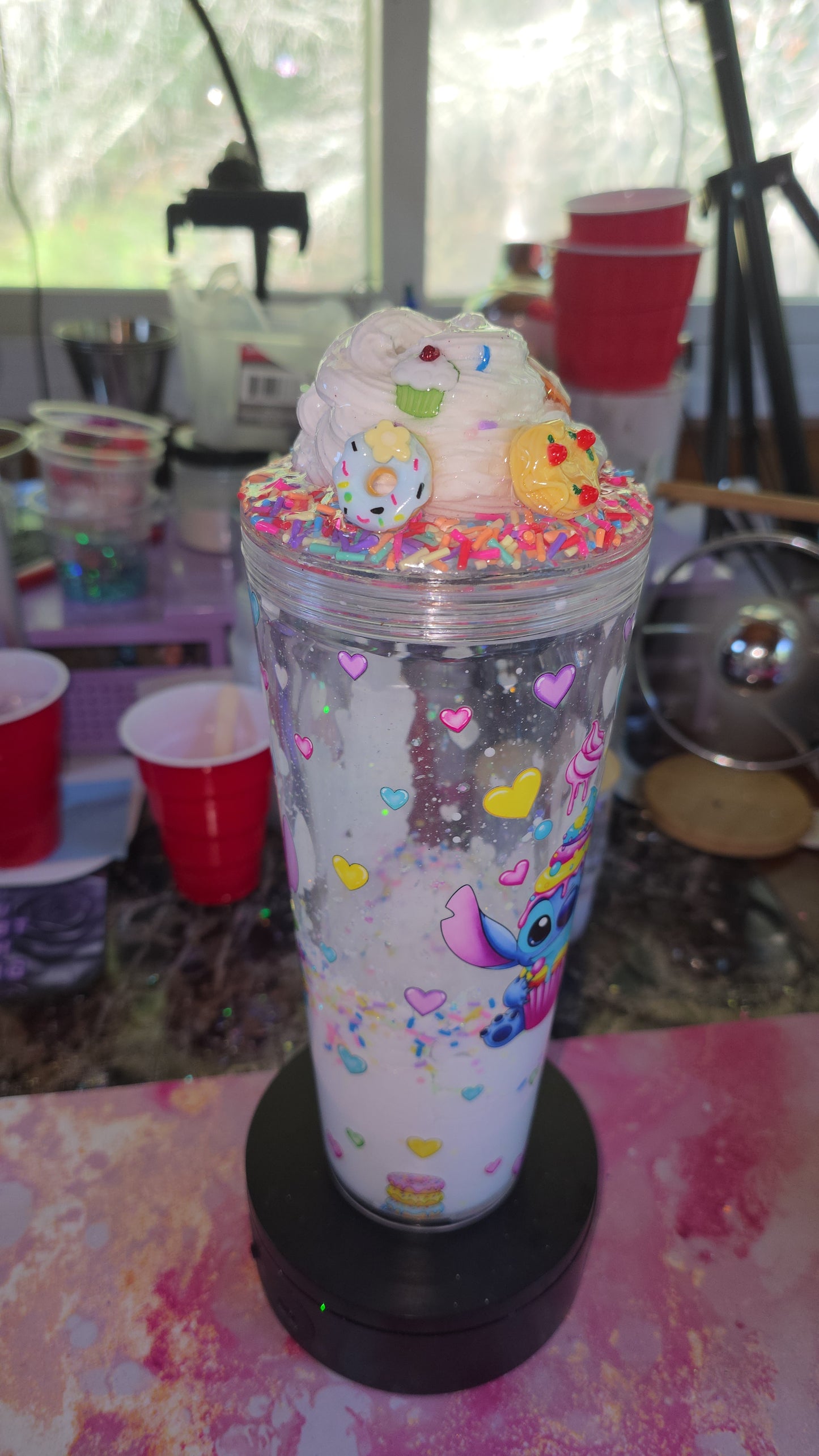 24oz Stitch milky sprinkle lava with coolwhio lid.