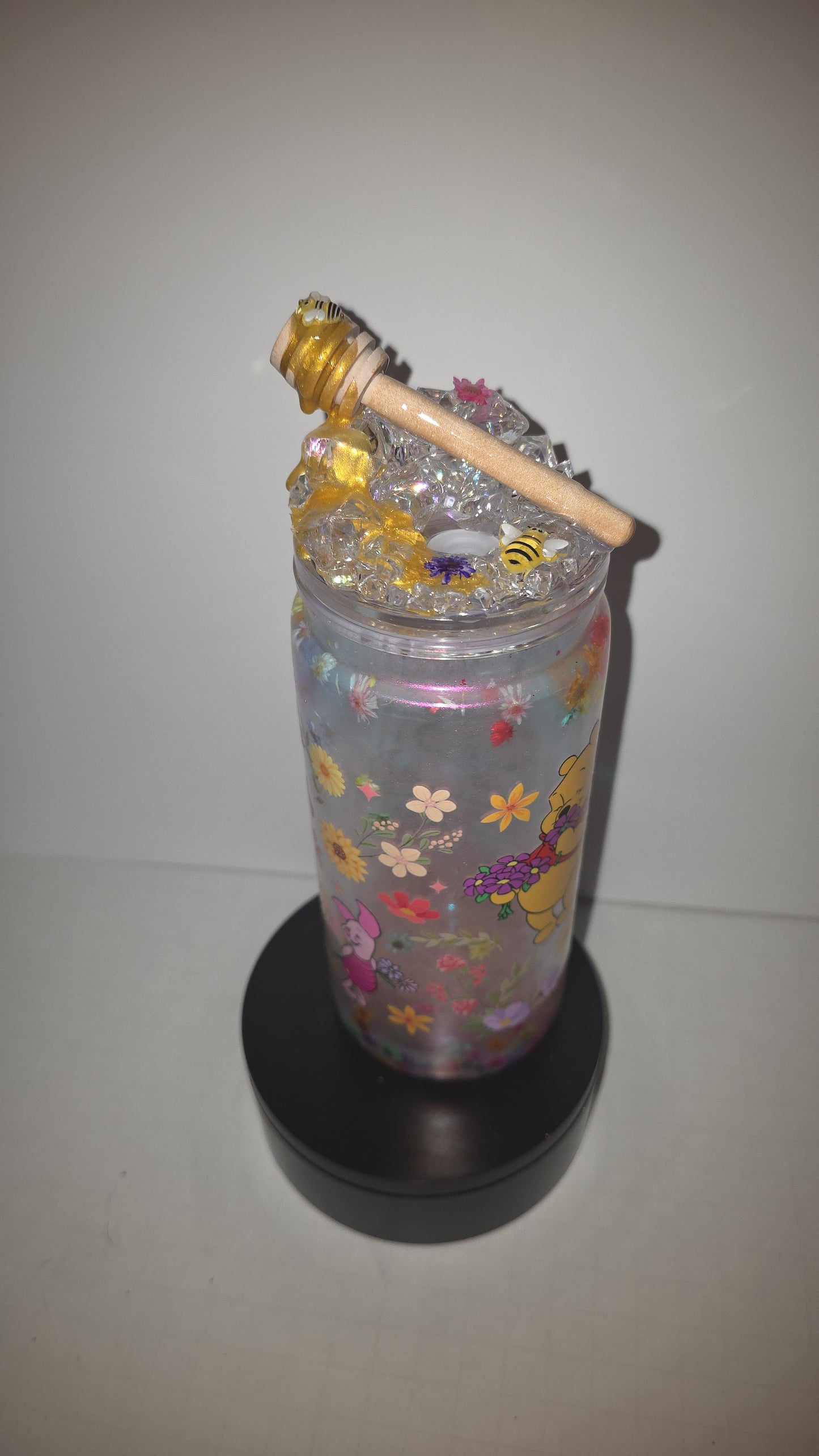 2o oz perlesscent Mica with floating dry flowers. Comes with matching, honey drip ice epoxy lid.